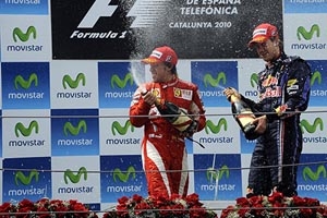 Fernando Alonso y Mark Webber en el podio del GP de España.